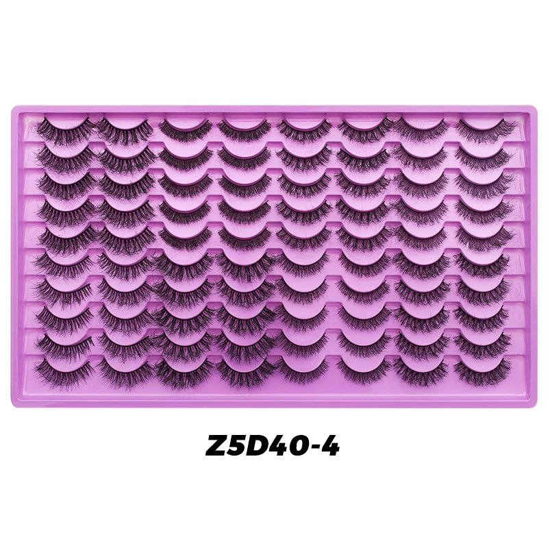 DINGSEN 40 Pairs Volume Strip Lashes Faux Mink False Eyelashes Kit Cosmetics Soft Fake Volume Eyelash Extensions Wholesaleمجموعة رموش صناعية DINGSEN – 40 زوجًا، تمنحكِ كثافة وحجمًا جذابًا، مصنوعة من ألياف ناعمة تشبه رموش المنك، لإطلالة طبيعية وأنيقة.
الكم