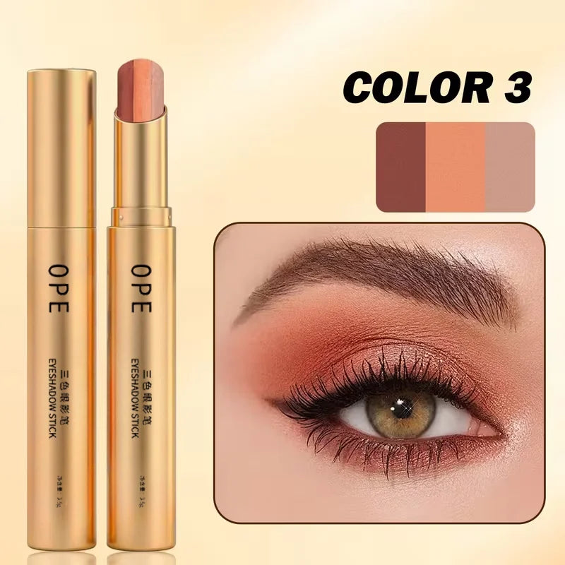Three-Color Eyeshadow Stick, Shimmering Highlighter Eyeshadow Stick, Waterproof and Long-Lasting Pearlescent Metallic Eyeshadowقلم ظلال العيون ثلاثي الألوان، قلم ظلال عيون لامع وقلم هايلايتر، مقاوم للماء ويدوم طويلاً، بلمعة لؤلؤية ومظهر معدني جذاب.